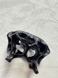 A pair of Chinese bird feeders with moulded design, one unglazed, on later wooden stands, Song