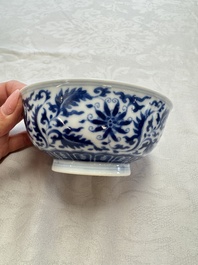 A pair of Chinese blue and white 'lotus scroll' bowls, Yongzheng mark and of the period