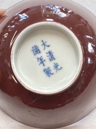 A pair of Chinese copper-red glazed bowls, Guangxu mark and of the period