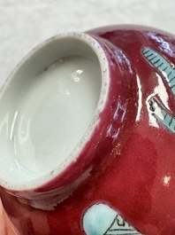 Two Chinese famille rose ruby-ground 'Landscape Scroll' cups and saucers, Yongzheng