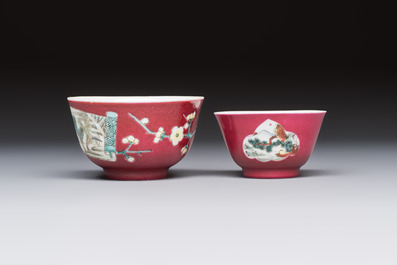 Two Chinese famille rose ruby-ground 'Landscape Scroll' cups and saucers, Yongzheng