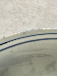 A Chinese blue and white 'Eight Immortals' bowl on a wooden stand, Chenghua mark, late Ming
