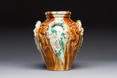 A polychrome Saintonge pottery vase with rope twist handles and mascarons, France, 17th C.