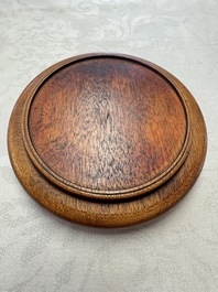 A Chinese blue and white 'Eight Immortals' bowl on a wooden stand, Chenghua mark, late Ming