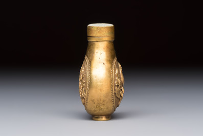 A Chinese gilt-bronze and mother-of-pearl-inlaid snuff bottle with birds among flowering branches, Guangxu mark and of the period