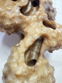 A Chinese carved jade model of a scholar's rock, 20th C.