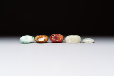 Five various Chinese jade, jadeite, agate and glass snuff bottles, 19th C.