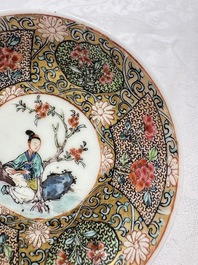 A fine Chinese famille rose gilt-decorated 'Elegant Beauty' cup and saucer, Yongzheng