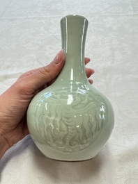 A pair of Chinese celadon-glazed bottle vases with incised phoenix design, Yongzheng mark, 19th C.