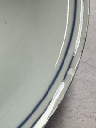 A Chinese blue and white 'Eight Immortals' bowl on a wooden stand, Chenghua mark, late Ming