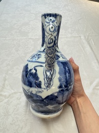 A Japanese Arita blue and white jug and a pair of plates, Edo, 17th C.