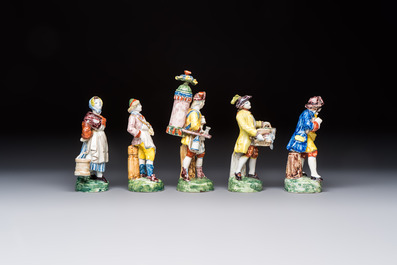 Five polychrome Delftware models of figures from everyday life, probably Desvres, France, 19th C.
