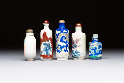 Five Chinese copper-red, blue and white, and polychrome snuff bottles, Yongzheng and Daoguang marks, 19/20th C.