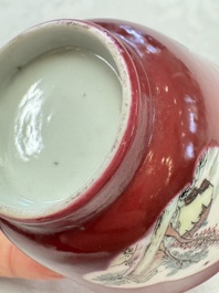 Two Chinese famille rose ruby-ground 'Landscape Scroll' cups and saucers, Yongzheng