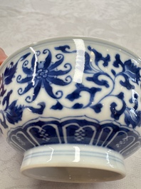 A pair of Chinese blue and white 'lotus scroll' bowls, Yongzheng mark and of the period
