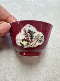 Two Chinese famille rose ruby-ground 'Landscape Scroll' cups and saucers, Yongzheng