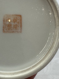 A Chinese polychrome brush pot with a bird standing on rockwork amid waves, Qianlong mark, 20th C.