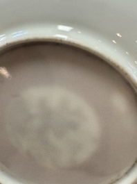Two Chinese famille rose ruby-ground 'Landscape Scroll' cups and saucers, Yongzheng