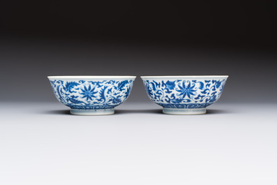 A pair of Chinese blue and white 'lotus scroll' bowls, Yongzheng mark and of the period
