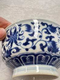 A pair of Chinese blue and white 'lotus scroll' bowls, Yongzheng mark and of the period