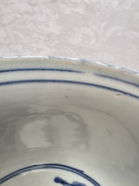A Chinese blue and white 'Eight Immortals' bowl on a wooden stand, Chenghua mark, late Ming