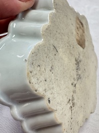 A Chinese famille rose ruby-ground 'Landscape Scroll' teapot and stand, Yongzheng
