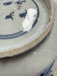 A Chinese blue and white 'Eight Immortals' bowl on a wooden stand, Chenghua mark, late Ming