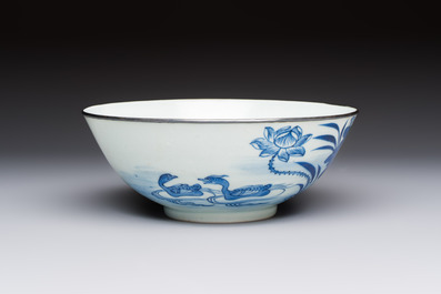 A Chinese blue and white 'Bleu de Hue' bowl with mandarin ducks in a lotus pond and a poem, Ngoan Ngoc 玩玉 mark, 19th C.
