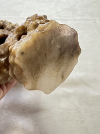 A Chinese carved jade model of a scholar's rock, 20th C.