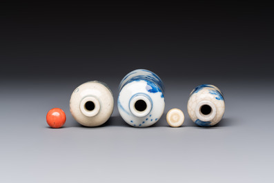 Three Chinese blue and white snuff bottles with landscapes and 'Buddhist Lions', Yongzheng marks, 19th C.