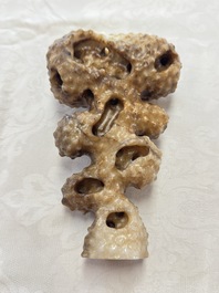 A Chinese carved jade model of a scholar's rock, 20th C.