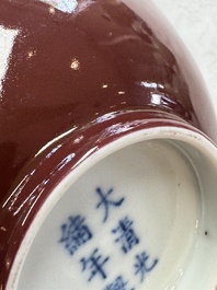 A pair of Chinese copper-red glazed bowls, Guangxu mark and of the period