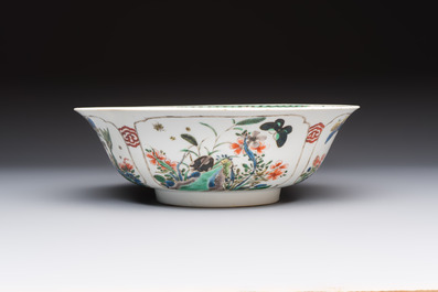 A Chinese famille verte bowl with bird and butterflies among flowers, lozenge mark, Kangxi