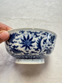 A pair of Chinese blue and white 'lotus scroll' bowls, Yongzheng mark and of the period