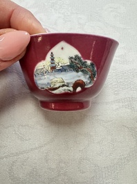 Two Chinese famille rose ruby-ground 'Landscape Scroll' cups and saucers, Yongzheng
