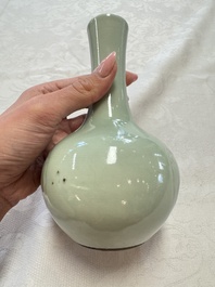 A pair of Chinese celadon-glazed bottle vases with incised phoenix design, Yongzheng mark, 19th C.