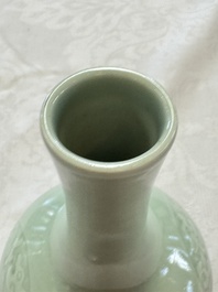 A pair of Chinese celadon-glazed bottle vases with incised phoenix design, Yongzheng mark, 19th C.