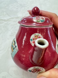 A Chinese famille rose ruby-ground 'Landscape Scroll' teapot and stand, Yongzheng