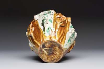 A polychrome Saintonge pottery vase with rope twist handles and mascarons, France, 17th C.