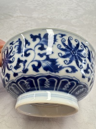 A pair of Chinese blue and white 'lotus scroll' bowls, Yongzheng mark and of the period