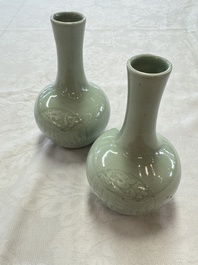 A pair of Chinese celadon-glazed bottle vases with incised phoenix design, Yongzheng mark, 19th C.