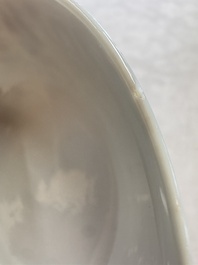 A pair of Chinese blue and white 'lotus scroll' bowls, Yongzheng mark and of the period