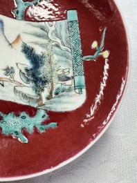 Two Chinese famille rose ruby-ground 'Landscape Scroll' cups and saucers, Yongzheng