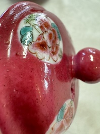 A Chinese famille rose ruby-ground 'Landscape Scroll' teapot and stand, Yongzheng