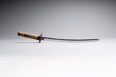 A Japanese wakizashi, signed Izumi no Kami Kanesada, with koshirae, Edo, 18/19th C.
