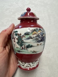 A Chinese famille rose ruby-ground 'Landscape Scroll' covered tea caddy and a covered milk jug, Yongzheng
