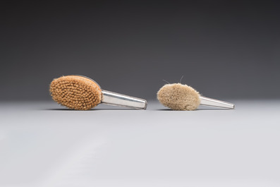 An Art Deco 12-piece silver toiletry set, Wolfers Fr&egrave;res, Brussels, 20th C.