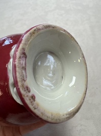 A Chinese famille rose ruby-ground 'Landscape Scroll' covered tea caddy and a covered milk jug, Yongzheng