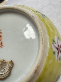 A pair of Chinese famille rose yellow-ground water pots with floral design and applied chilong and bats, Qianlong mark, 19/20th C.