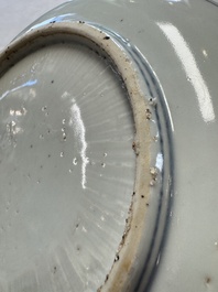 A Chinese blue and white ko-sometsuke 'Buffalo Herder' plate for the Japanese market, Tianqi